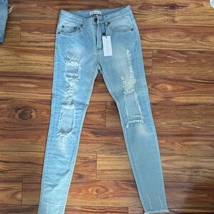 Showpo Light Blue Distressed Skinny Jeans